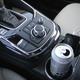 Simple knob and button based infotainment controls, plus a toggle for sport mode. Sport mode holds each gear longer when accelerating and downshifts under braking, just as you’d do on track.